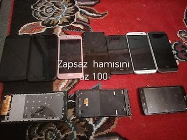 Müxtəlif markalardan telefon və ehtiyat hissələri dəsti. Tərkib: -