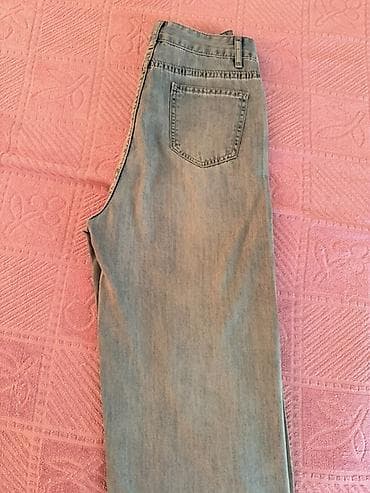 Cinslər: Qadın cins şalvar - Rəng: açıq mavi denim, yüngül yuyulma effekti - — 2