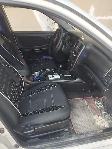 Hyundai Sonata sedan – gümüşü rəngdə, avtomatik transmissiya