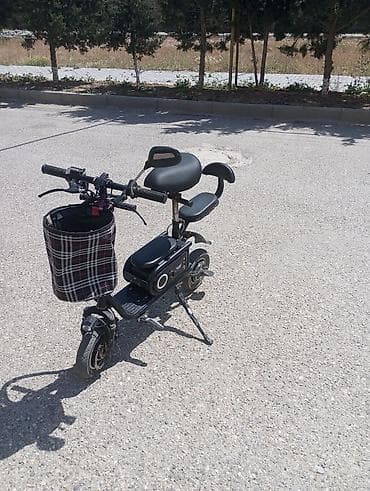 10 lt 663: Elektrikli skuter. 10 Ah. Tam doldurma ilə 20-25 km. Sürət təxminən 20 — 4