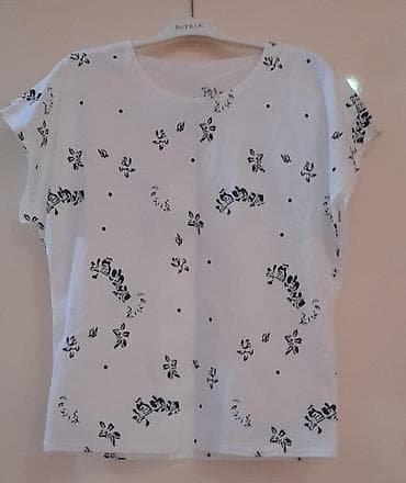 Qadın geyimləri: Ağ rəngli qadın bluzası təzə - Rəng: ağ, üzərində xırda qara naxışlar — 1