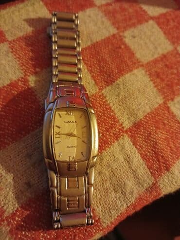 moskva univermagi qızıl saatlar: Qol saatı, Omax — 5