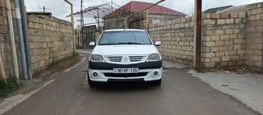 şkoda: Renault Logan sedan – ağ rəng, 4 qapı, AZ nömrə nişanı 90-VF-135 — 1