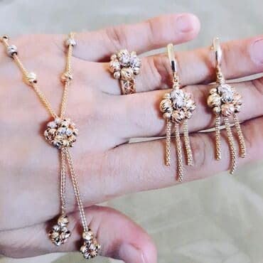 italyan qizili: Dəstə daxildir: Boyunbağı, Kulon, Sep, Pandora, Sarı qızıl, 585 Əyar, 13900 g — 5