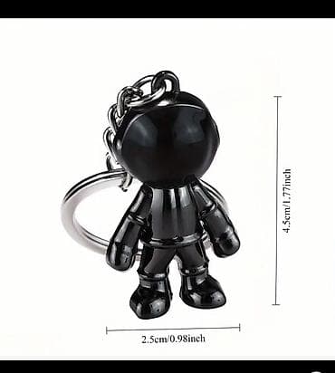 mini kultivator satisi: Metal Kosmonavt brelok qara reng — 1