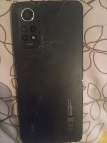 Компьютеры, ноутбуки и планшеты: Xiaomi 12 Pro, 256 ГБ, цвет - Черный, 
 Битый — 2