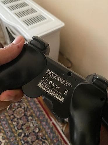 ps3 qiymeti kontakt home: Sony PlayStation 3 (PS3) Slim oyun konsolu + orijinal simsiz DualShock — 3