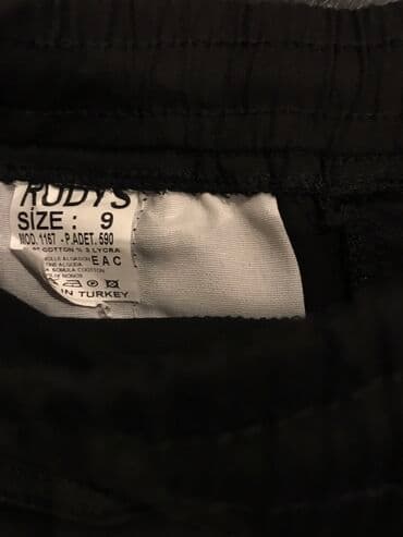 salvarlar ve koftalar: Qara karqo cibli şalvar yenidir 9 yaş rəngi tünd qaradlr şəkildə acıq — 3