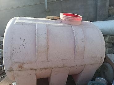 Plastik su çəni.təcili satılır 60 azn 1 tonluq işlənmiş su çəni qapağı