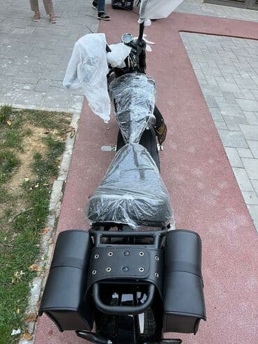 mopedlər tufan: Şəhər içi rahat və stilsiz gediş üçün elektrik kruizer. Plug-in şarj — 4