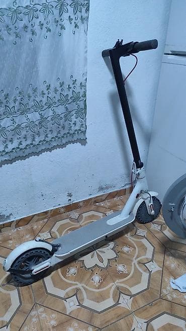 Elektrik skuter - Yığcam və qatlanan konstruksiya: uzun gövdə