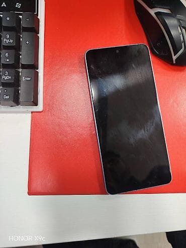 philips xenium 9@9d: Honor X9c — 1