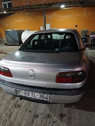 qazel radiator: Opel Omega: 2 l | 1996 il 300000 km Sedan — 4