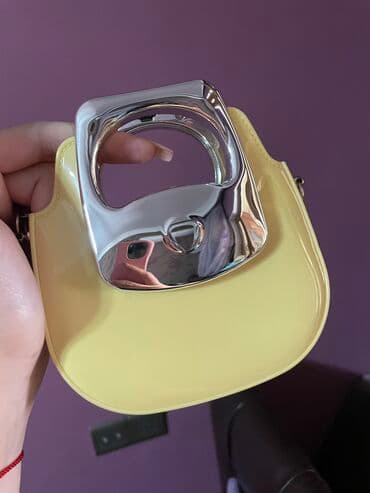 qaşlı çanta: Teze — 1