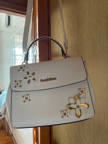 Toy paltarları və aksesuarları: Canta . Moskvadan alinib . Hec işlənməyib 15 — 2