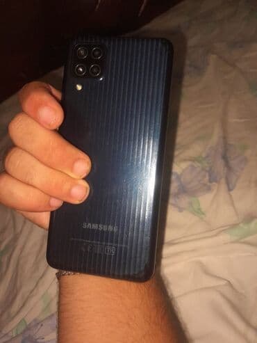 ucuz kameralar: Samsung Galaxy M12, цвет - Черный — 1