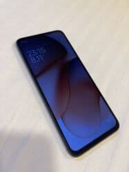 xiaomimi 10256 gb: Xiaomi 12, 128 GB, rəng - Qara, 
 Düyməli, Barmaq izi, İki sim kartlı — 4