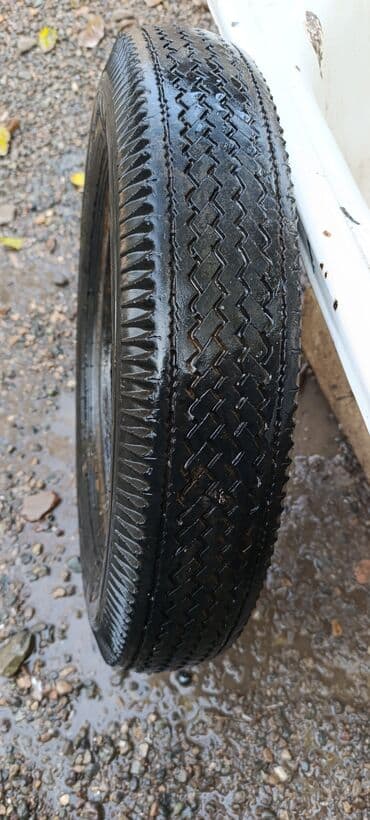 15 disk təkər: Avtomobil şini - Növ: Təkər (şin) - Ölçü işarələri görünmür; — 1