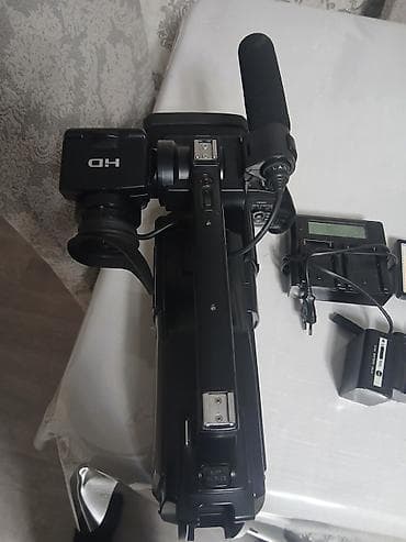 panasonic ag ac120en: Sony HXR-MC1500 peşəkar video-kamera Xüsusiyyətlər: - Full HD çəkiliş — 3