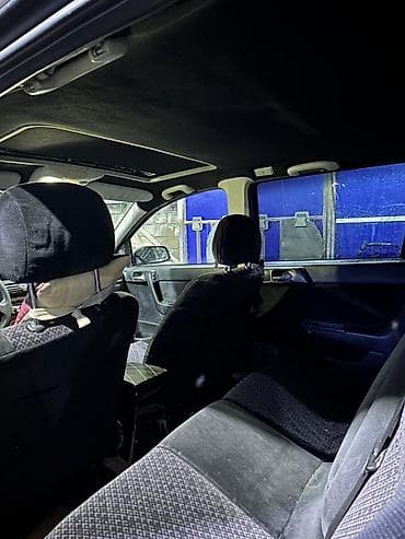 stanqa: Opel Astra Caravan (universał) – qara rəng, 5 qapı, geniş baqajlı ailə — 3