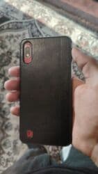 Техника для кухни: Samsung Galaxy A10, 32 ГБ, цвет - Красный, Face ID — 2