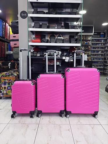 женские чемоданы из поликарбоната: Parlaq çəhrayı sərt korpuslu çamadan dəsti – 3 ölçü. - Material — 1