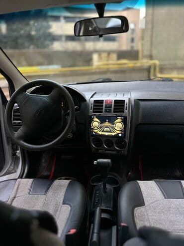 диски на 15 на ниву: Hyundai Getz, gümüşü rəng Texniki xüsusiyyətlər: - Yanacaq növü — 8