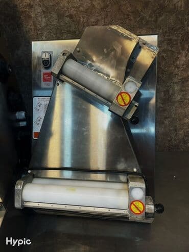 Xəmir açma aparatı paslanmayan poladdan hazırlanmışdır və şaquli