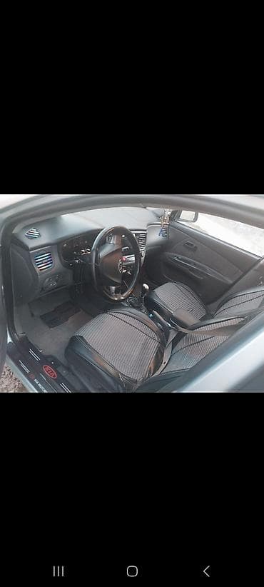 lada priora universal: Kia Rio: 1.5 l | 2007 il Hetçbek — 4