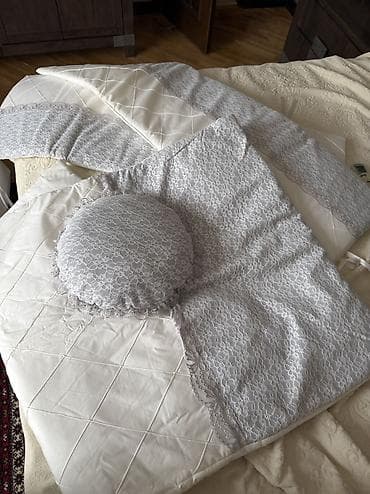 payka ütüsü: Kravatin kenari ucun baglama, poduwka yorgan ve ustundeki tul bawliq — 3