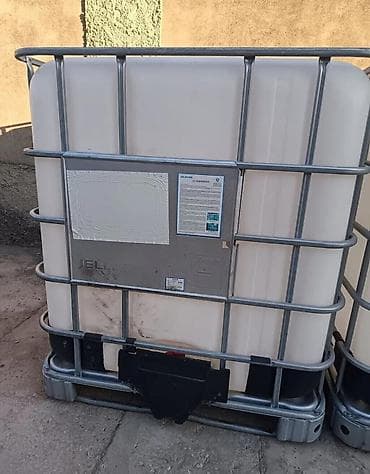 konteyner satilir: Su ceni satilir 100azn 1tonluq unvan zire vusqa21000 litrlik IBC — 1