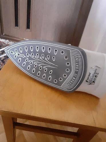 par utusu: Sayona buxarlı ütü Xüsusiyyətlər: - Seramik altlıq – sürüşkən səth — 3