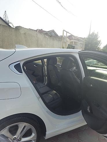 chevrolet salon: Chevrolet Cruze Hatchback (ağ rəng) - Kuzov: 5 qapılı hatchback — 10