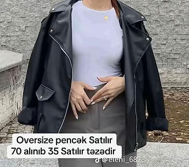 Oversize qadın pencəyi – qara rəngdə, dəri görünümlü parça. Klassik lalafo.az -da Oversize qadın pencəyi – qara rəngdə, dəri görünümlü parça. Klassik