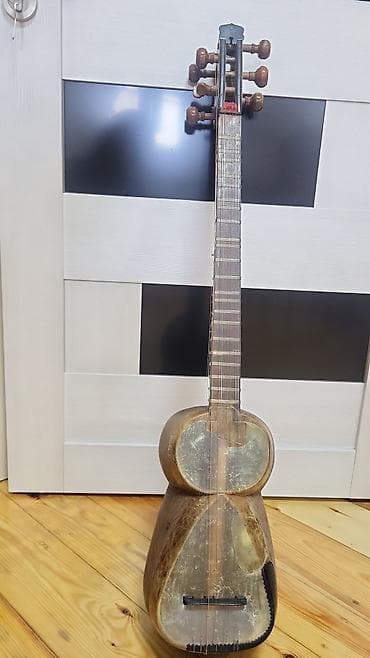 akustik gitara simi: Tar – milli simli musiqi aləti - Korpus: armud formalı, iki nazik — 1