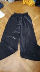 yupqa kofta: Qadın geyimləri dəsti - Qara rəngli t‑shirt: Ön hissədə “alexander — 12