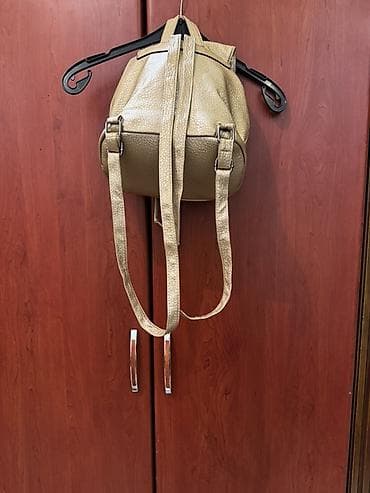 Велосипеды: - Qadın üçün 2 ədəd çanta dəsti 1) Qızılı rəngdə mini bel — 2