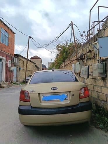 k5 kia: Kia Rio: 1.4 l | 2008 il Sedan — 2