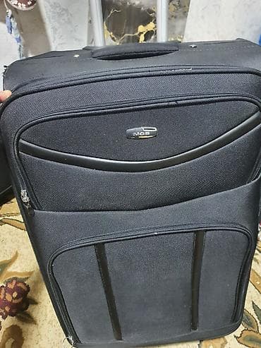 parca camadan: MGS markalı tək çamadan – böyük ölçülü, parça korpuslu, qara rəng. az — 1