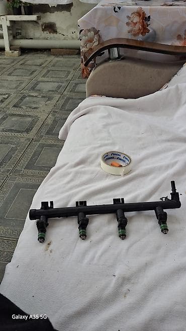 Məhsul: Benzin injektor relsi və 4 ədəd injektor komplekti Təsvir: -