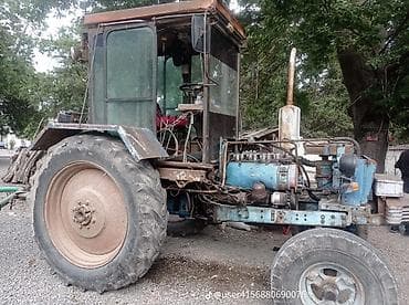 maşın guzguləri: Təsvir: - Kənd təsərrüfatı işləri üçün universal təkərli traktor - — 2