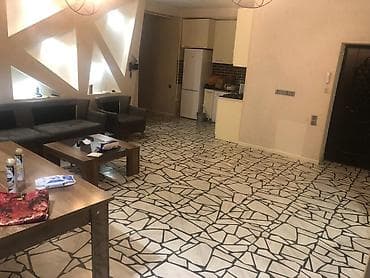 ev menzil: Geniş və işıqlı studiya tipli mənzil. Böyük pəncərələrə malik salonla — 2