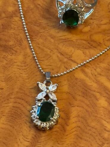 1 qram qizilin qiymeti: Dəstə daxildir: Bilərzik, Boyunbağı, Kulon — 4