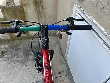 suktur: Qırmızı rəngli dağ velosipedi - Alüminium gövdə, ismi “ISIME” yazılı — 2