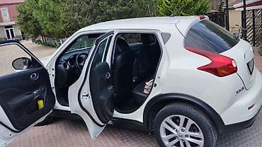 Салон: Nissan Juke – salon və interyer - Rəng: ağ eksteryer, qara interyer - — 7