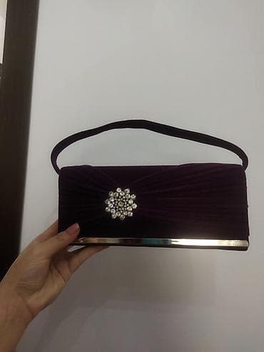 sumka kişi: 20 manat . 
qiymetde anlaşa bilerik . 
 heç isdifade olunmayıb — 2