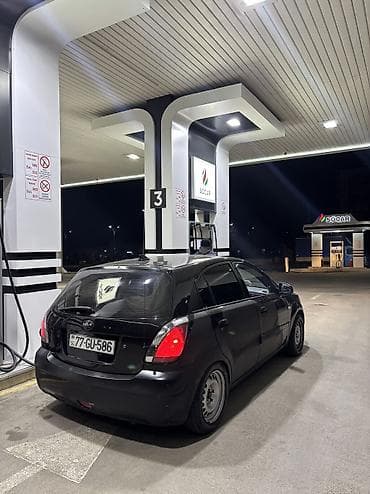 kia rio 2009: Kia Rio: 1.5 l | 2009 il Hetçbek — 4
