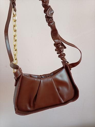 sumkalar: MAYA DƏYƏRİNƏ Qadın çantaları – müxtəlif modellər 1) Çoxfunksiyalı — 10