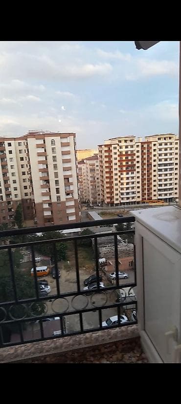 Yeni Yasamalda yeni tikili binada. 77 avtobusun son duracagi. 18 — 1