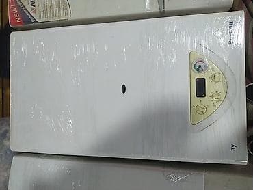 gencede islenmis soyuducular: Divar tipli qaz kombisi - Ön paneldə analoq manometr (sistem təzyiqi — 1